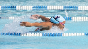 Cayman&#039;s Jillian Crooks on her way to 100m Butterfly gold.