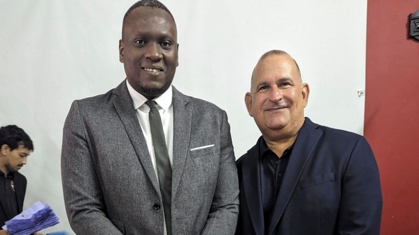 Newly-elected TTFA President Kieron Edwards (left) and Chair of Normalisation Committee, Robert Hadad.