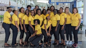 Lisa Smith (right) Head Coach of Antigua and Barbuda along with her daughter Lauren, the assistant coach and members of the Antigua and Barbuda netball team.