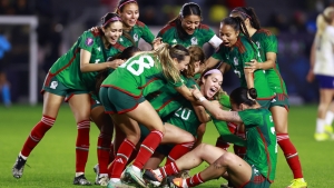 Mexico players celebrate their historic win over four-time World champions United States.