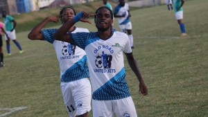 Tiquanny Williams (right) celebrates after scoring one of his three goals on Sunday.