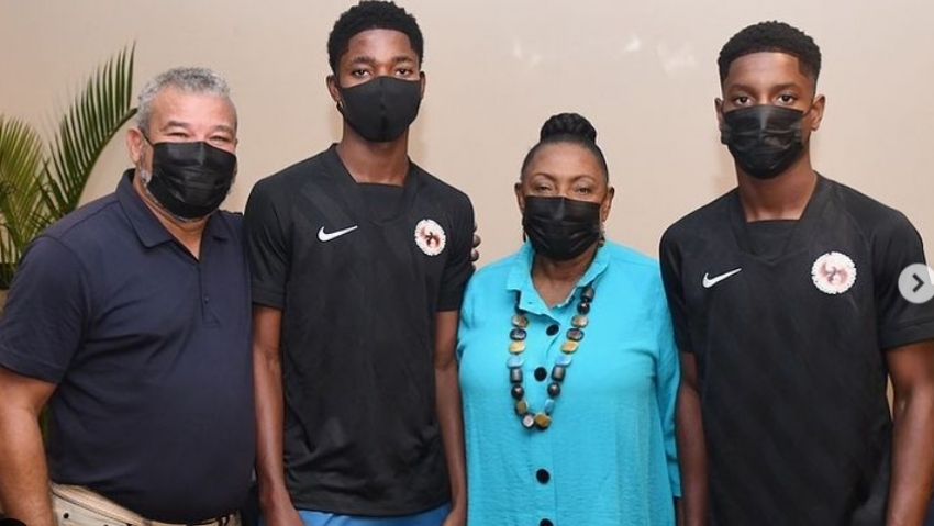 Jay Anthony Clarke (second left) and Thierry Mills with Minister Olivia Grange and Craig Butler shortly before they departed for the Brooke House College in England.