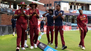 West Indies players acknowledge fans after their Super Six match against Australia is abandoned.