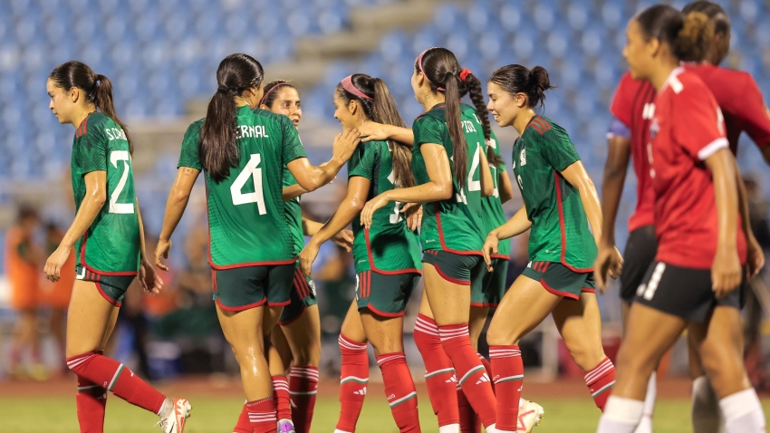 Mexico celebrate a goal against Trinidad and Tobago.