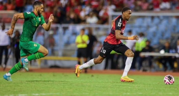 Trinidad and Tobago in action against Grenada.
