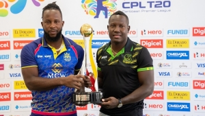 Barbados Royals captain Kyle Mayers and Jamaica Tallawahs captain Rovman Powell with the Hero CPL trophy on the eve of the 2022 final in Providence, Guyana on Friday night.