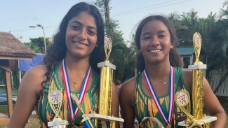 Sanjana Nallapati (left) and Katherine Risden (right) took doubles gold.