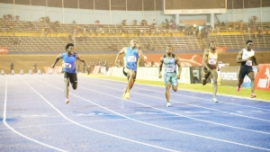 It was almost a blanket finish behind the General Accident sponsored Mens 100 metre race winner Nigel Ellis (2nd left) of Elite Performance Track Club as the Olympic Games hopeful stormed to victory in an impressive 10.09s in rainy conditions at the Gibson-McCook Relays at the National Stadium on Saturday, February 24. Javorne Dunkley (left) was second in 10.17s, Oshane Bailey (centre) was fourth in 10.25s, Odaine McPherson (2nd right) was 5th in 10.32s while Rasheed Foster (right) of Mico University College was 7th in 10.37s.