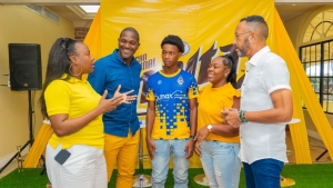 Malta&#039;s Brand Manager, Jodi-Ann Campbell, and Brand Ambassador, Neville Bell, had an insightful discussion with Harbour View Footballer Devonte’ Allen (middle) and his mother, Latoya Earle (second right), about the crucial role of nutrition in an athlete’s performance and well-being. From left to right: Malta Brand Manager, Jodi-Ann Campbell; Professional Football Jamaica Limited Chief Executive Officer, Owen Hill, Harbour View footballer, Devonte Allen, his mother, Latoya Earle and Malta’s Brand Ambassador, Neville Bell.