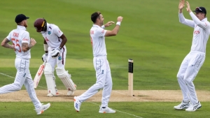 Ben Stokes (left), James Anderson (middle) and Zak Crawley (right) celebrating the wicket of Alick Athanaze (background) on day two of the first Test between England and the West Indies at Lord&#039;s on Thursday.