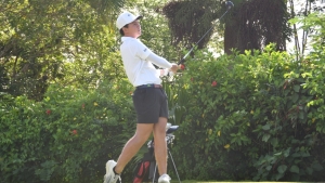 Day one leader- Jamaica’s Ryan Lue tees off on hole number one prior to scoring an impressive five under par 67 for the first round of the 36th Caribbean Amateur Golf Championship which was played at the Caymanas Golf Course in St. Catherine on Wednesday.