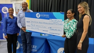 From left: Shawn Lawrence, Investment Advisor Mayberry Investments Limited, Damian Whylie, General Manager, Asset Management, Mayberry Investments Limited, Audrey Allwood, President, JABBFA and Stephanie Harrison, VP-Marketing, Mayberry Investments Limited.