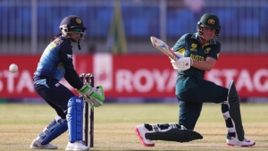 Beth Mooney (right) steered Australia to victory with 43*.