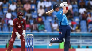 Liam Livingstone plays a shot during his knock of 124* against the West Indies on Saturday as West Indies captain Shai Hope looks on.