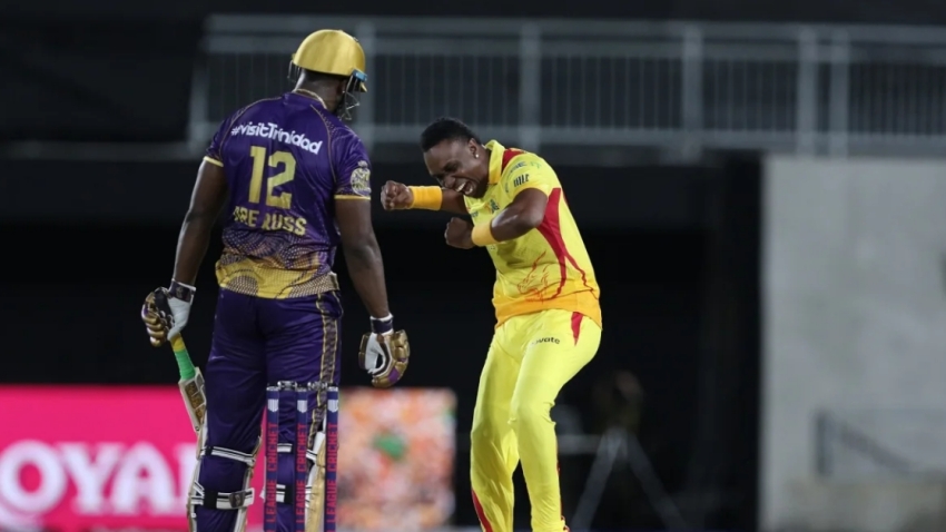Dwayne Bravo celebrating the wicket of Andre Russell.