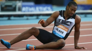 Yohan Blake after injuring his hamstring at the Glasgow Grand Prix in 2014.