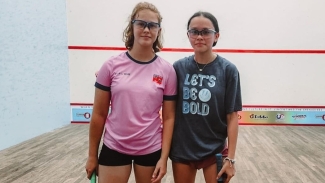 Guyana&#039;s Avery Arjoon (right) shares a photo opportunity with Bermuda’s Somers Stevenson after their battle in the girls&#039; Under-15 final at the CASA Junior Championships in St Vincent and the Grenadines on Monday.