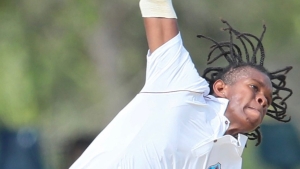 Isai Thorne bowling for the West Indies U19s.