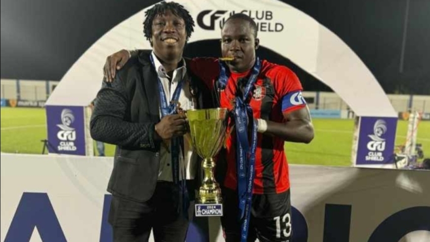 Arnett Gardens Head coach Xavier Gilbert (left) and captain Fabian Reid.