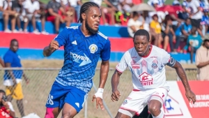 Mount Pleasant FA&#039;s Alex Marshall (left) being marked by Portmore United&#039;s Seigel Knight during their 2024-25 JPL opener at the Anthony Spaulding Sports Complex on Sunday.