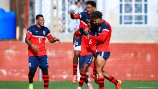 Cuba players celebrate.