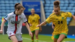 Young Reggae Girlz striker Solai Washington in action against Sheffield United during a recent camp in England.