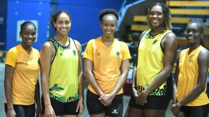 Captain Jhaniele Fowler-Nembhard (2nd R) shares a happy moment with the new comers to the Sunshine Girls team after their final training session Wednesday night prior to leaving for the Horizon Series in England.  Others in the photo are (L to R) Crystal Plummer, Rhea Dixon, Mischa Creary and Teresa Beckford.