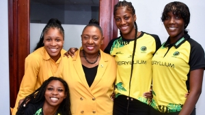 Minister Olivia Grange with members of Jamaica&#039;s Sunshine Girls
