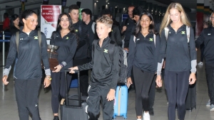 Members of the Jamaican team leaving the island on Sunday.