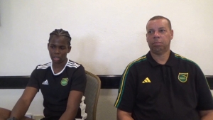 Khadija &#039;Bunny&#039; Shaw and Hubert Busby share thoughts during a pre-game interview.