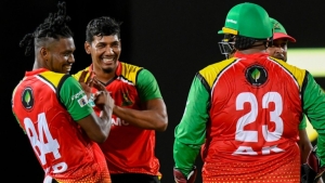 Guyana Amazon Warrior&#039;s Gudakesh Motie (second left) celebrate a wicket with teammates during their CPL contest against St Kitts and Nevis Patriots at Warner Park on Thursday.