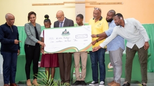 It was all smiles when Nekesha Bartholomew-Ramey (2nd L), Consumer Marketing Manager at Nestle - parent company of title sponsor MILO - presented the sponsorship cheque for the 2024 staging of the relays. Sharing in the occasion at the Holy Trinity Church Hall, MoBay on Tuesday were (L-R) Chris Samuda, President of the Jamaica Olympic Association (JOA) who also announced the association&#039;s continued sponsorship of the MILO Western Relays, Zabranda Samuels of Green Island High School, Ray Harvey, meet organizer, Tijanh Samuels of Grange Hill High School, Tony Myers - meet director, coach Keilando Goburn and patron Chester McCarthy of GC Foster College.   